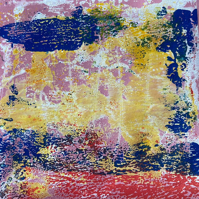 On a background of pink card, there are pale yellows and creams with stronger white marking. There are also patches of dark blue and a caroet of textured red at the bottom of the image. 