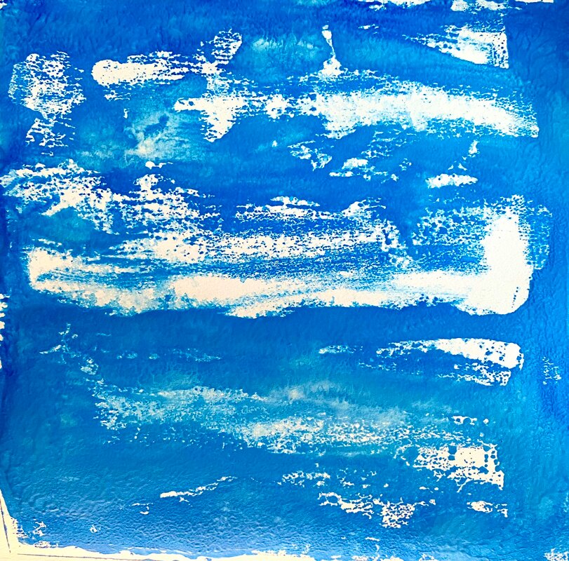 An initial experiment with one bold colour on white card. Bright blue with large patches of white showing through, sky- or sea-like. 